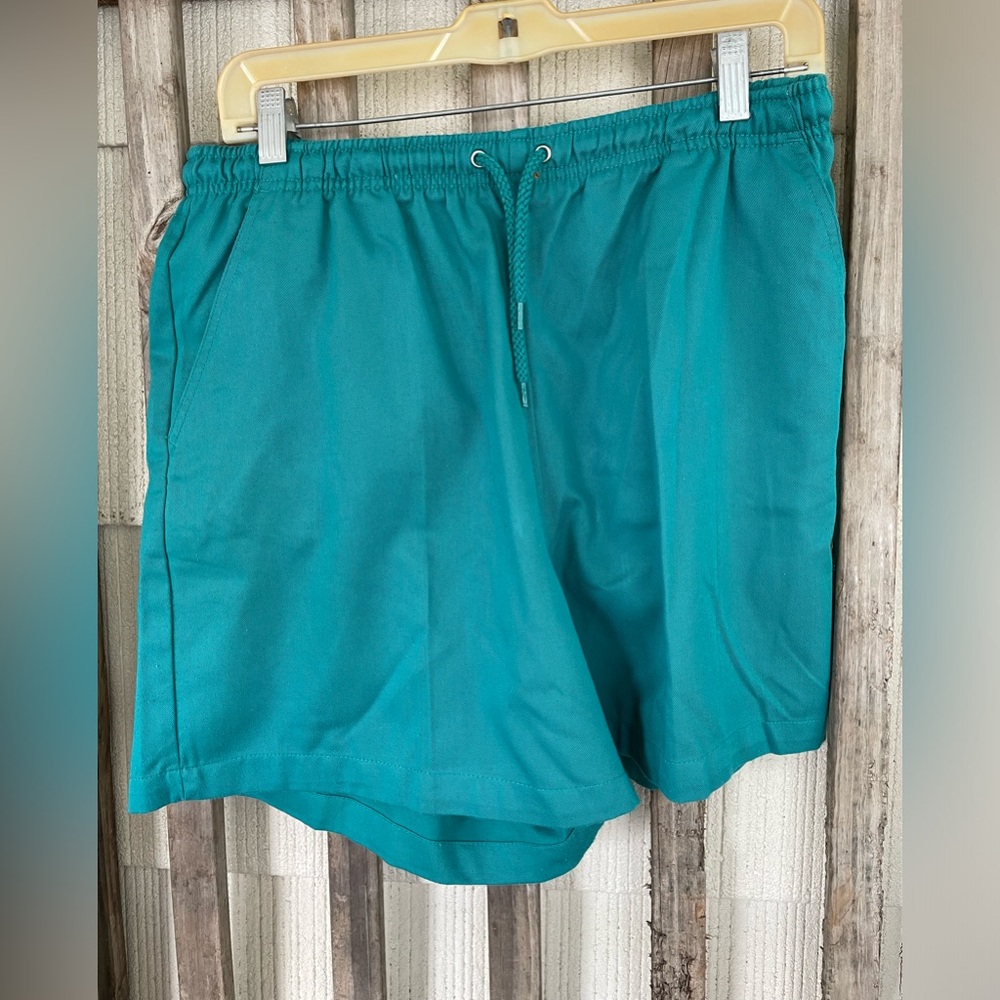 BASIC EDITIONS size Medium. Pockets, drawstring. Aqua